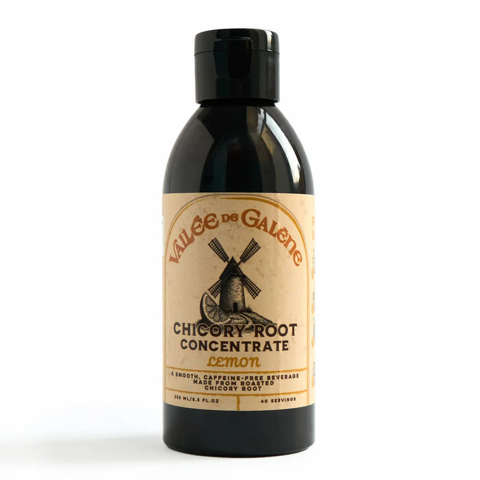 Bottle of Chicory Root Concentrate with a black cap on a white background